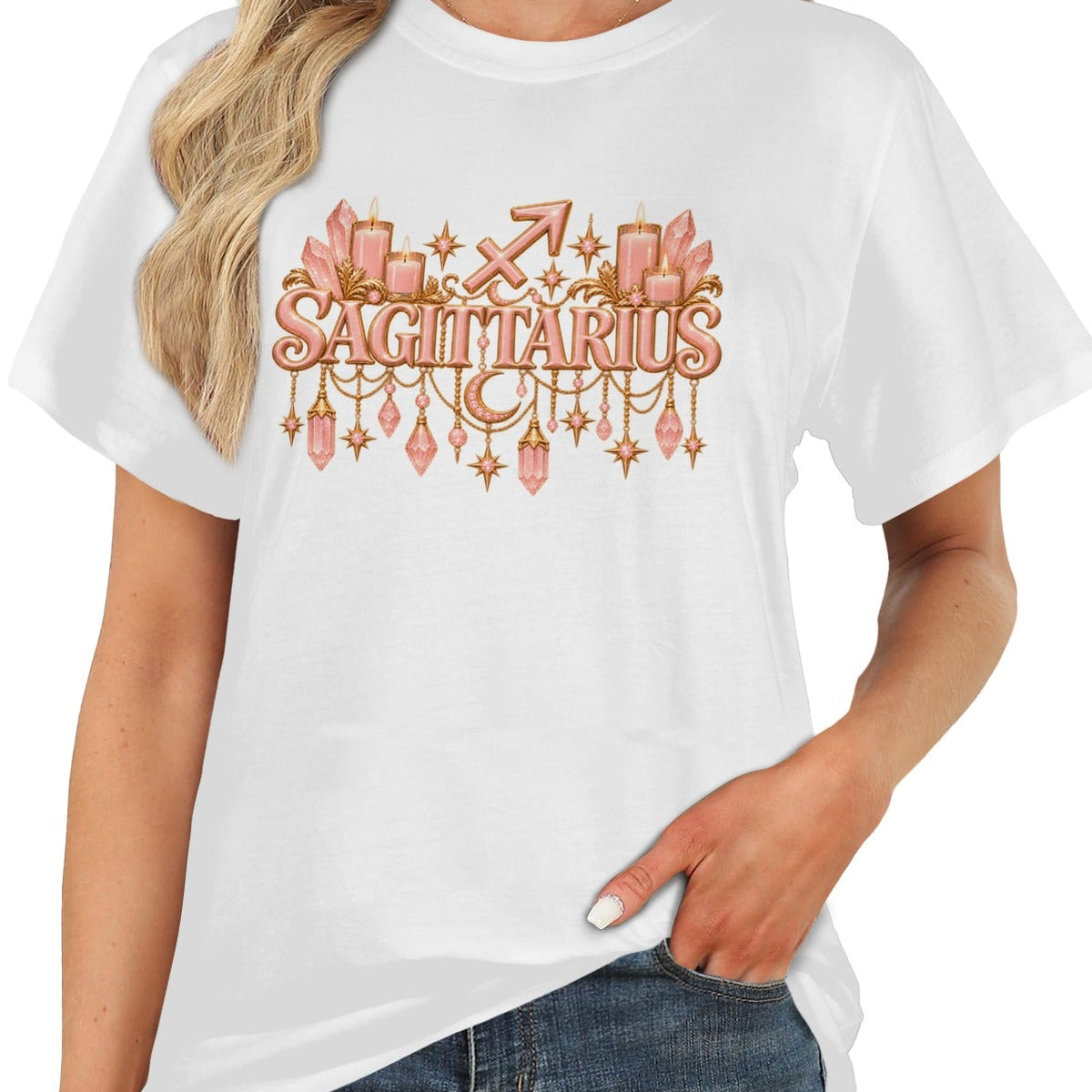 A woman wearing a white short-sleeve t-shirt with a pink and gold Sagittarius zodiac graphic on the chest, paired with blue jeans against a plain white background.