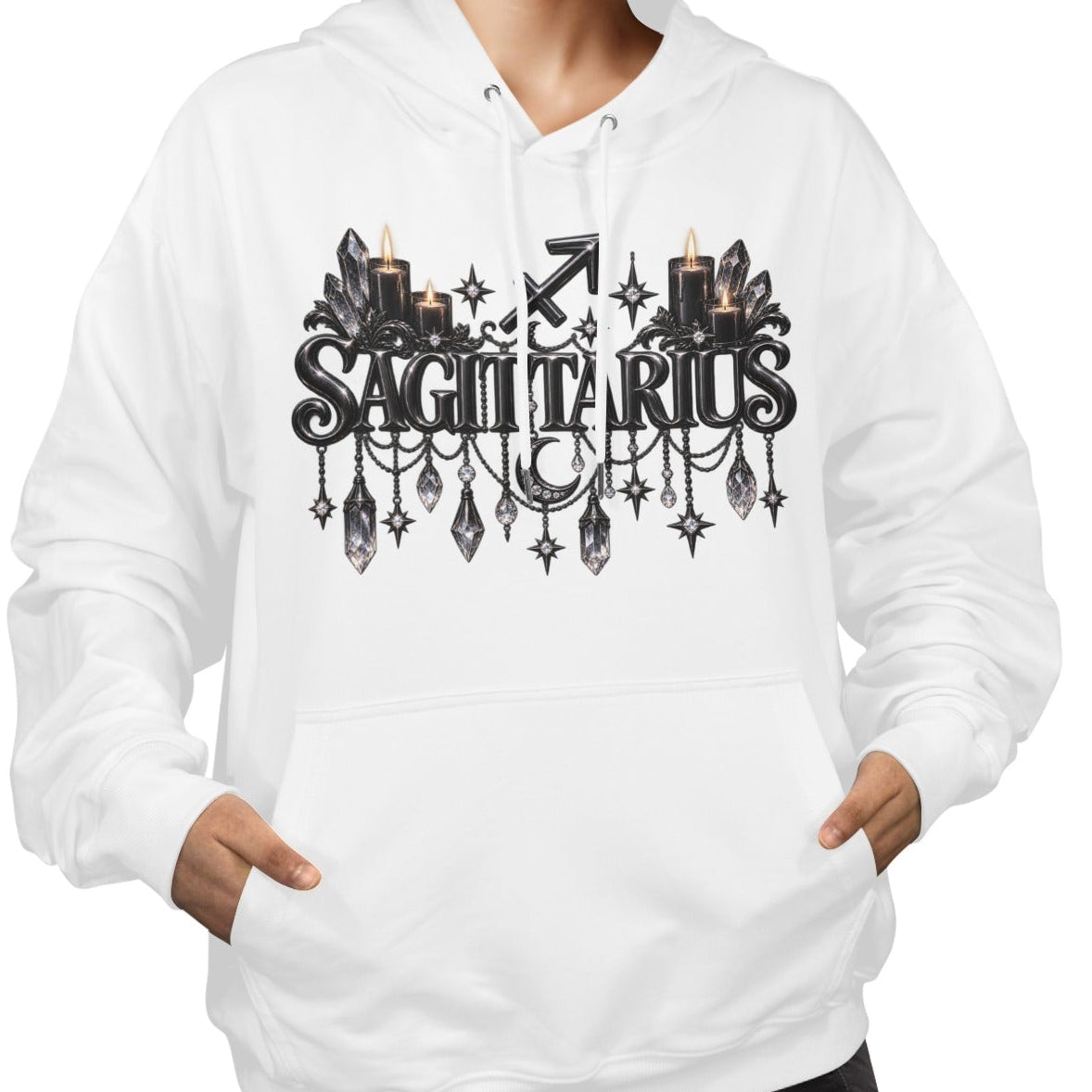 A woman wearing a white pullover hoodie with a black 'Sagittarius' zodiac graphic on the chest, featuring candles, crystals, and stars. The background is solid white.