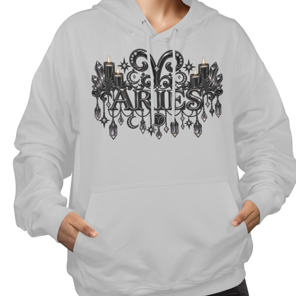 A woman wearing a light gray pullover hoodie with a black gothic-style graphic on the chest that reads 'PARTIES' with candles and ornate details, paired with black pants against a plain white background.